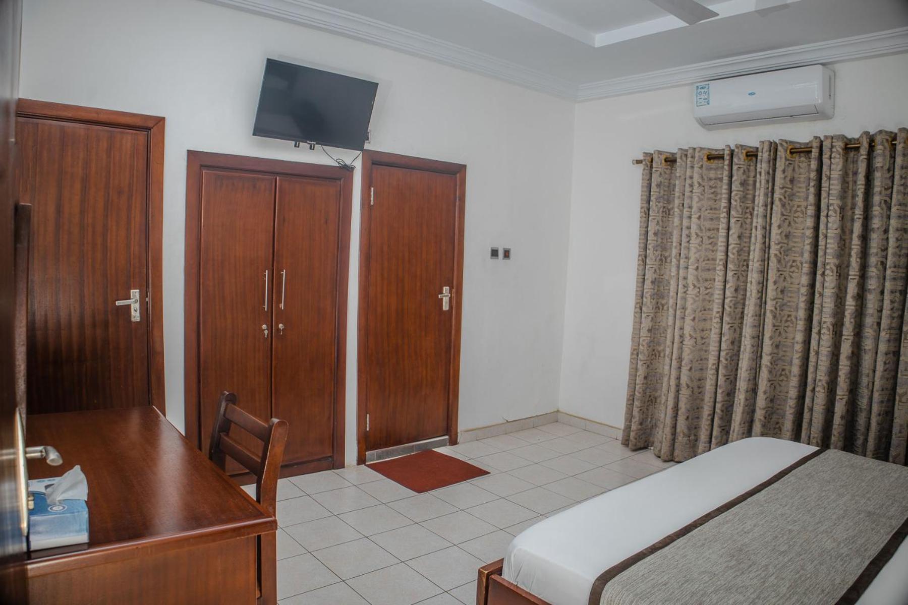 Stadium Hotel Кумаси Экстерьер фото